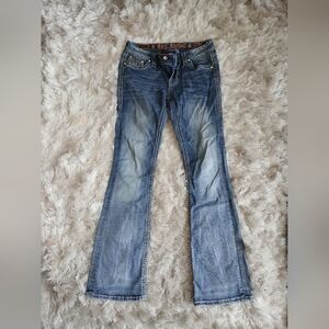 Rock Revival Jeans
Has a small stain on the right leg